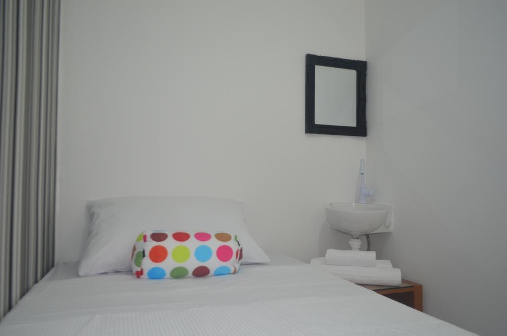 Quarto Individual Standard com Banheiro Compartilhado